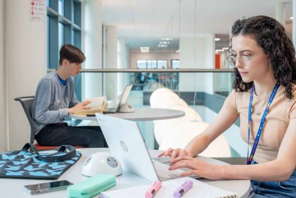 University-students-using-laptops-loaned-from-locker